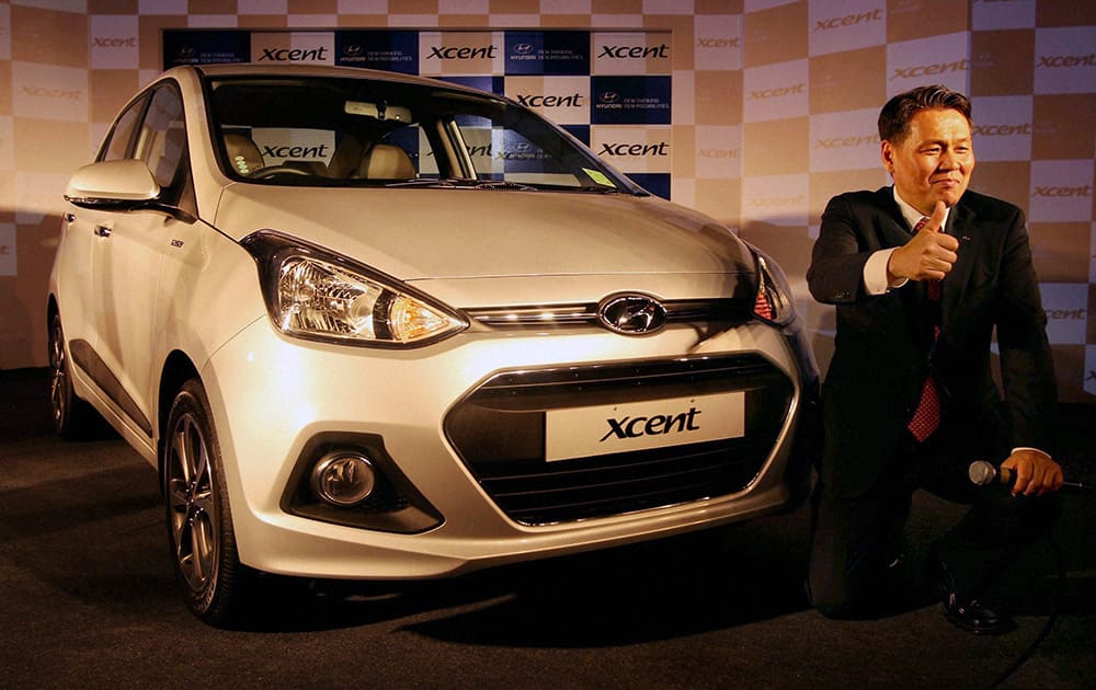 Managing Director & CEO Hyundai Motor India Limited, B.S. Seo at the launch of the new `Xcent` sedan in New Delhi.
