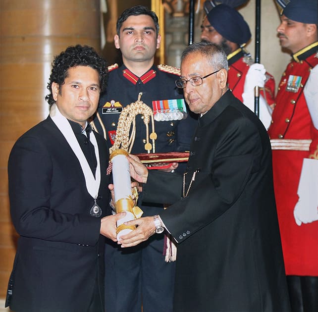 President Pranab Mukherjee confers legendary cricketer SachinTendulkar with country`s highest civilian honour Bharat Ratna in Rashtrapati Bhavan.