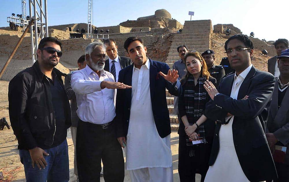 Bilawal Bhutto Zardari, third from left, son of Pakistan`s assassinated Prime Minister Benazir Bhutto visits the site of Sindh Cultural Festival in ruins of Mohenjodaro in Pakistan.