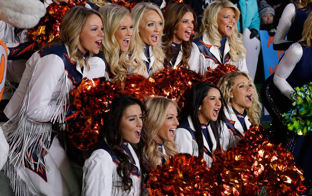 Denver Broncos cheerleaders cheer during a live broadcast of Good Morning America at Times Square in New York.