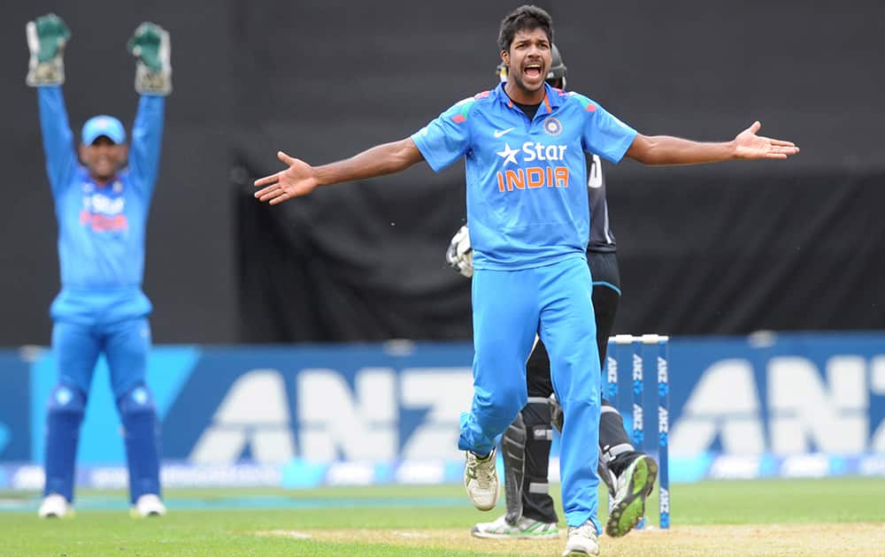 India’s Varun Aaron unsuccessfully appeals New Zealand`s Ross Taylor wicket lbw in the fifth and final one-day international cricket match in Wellington, New Zealand.