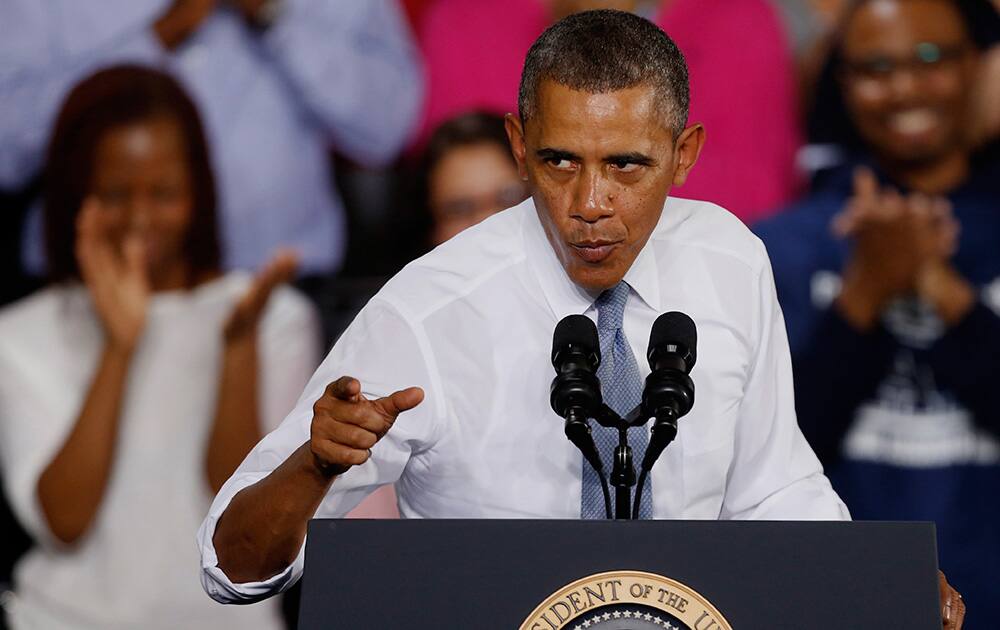 President Barack Obama speaks about job training, at General Electric`s Waukesha, Wis. gas engine plant.