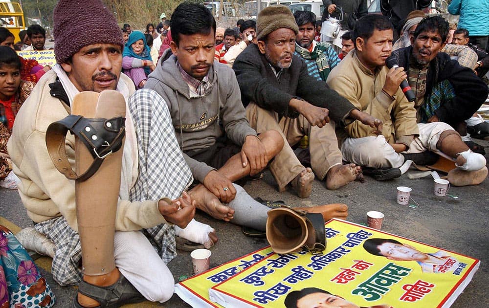 Leprosy affected people, staging silent protest on World Leprosy day, outside Delhi Secretariat in New Delhi.