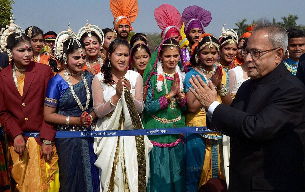 Various artists of Republic Day Parade,2014, during a meeting with President Pranab Mukherjee at Rashtrapati Bhavan in New Delhi.