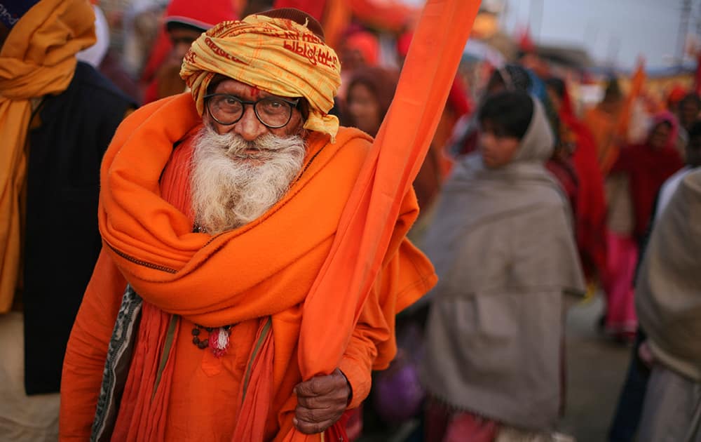 A Sadhu attends the annual traditional fair “Magh Mela” at Sangam, the confluence of the rivers Ganges, Yamuna and mythical Saraswati in Allahabad.