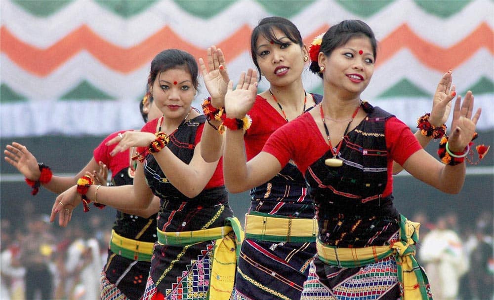 Artists perform traditional dance during the celebration of 65th Republic Day Function, at Veterinary College Playground, Khanapara in Guwahati.