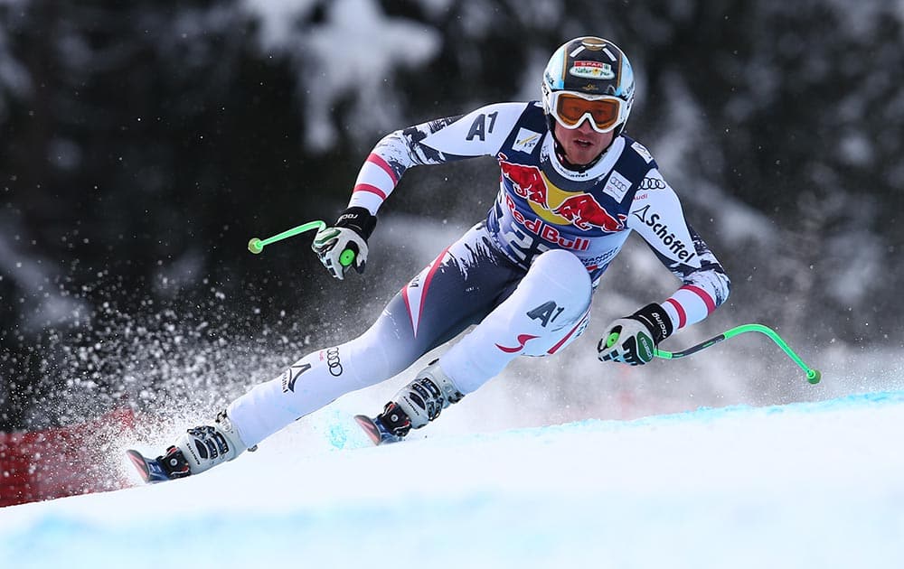 First placed Austria`s Hannes Reichelt competes during an alpine ski, men`s World Cup downhill, in Kitzbuehel, Austria.