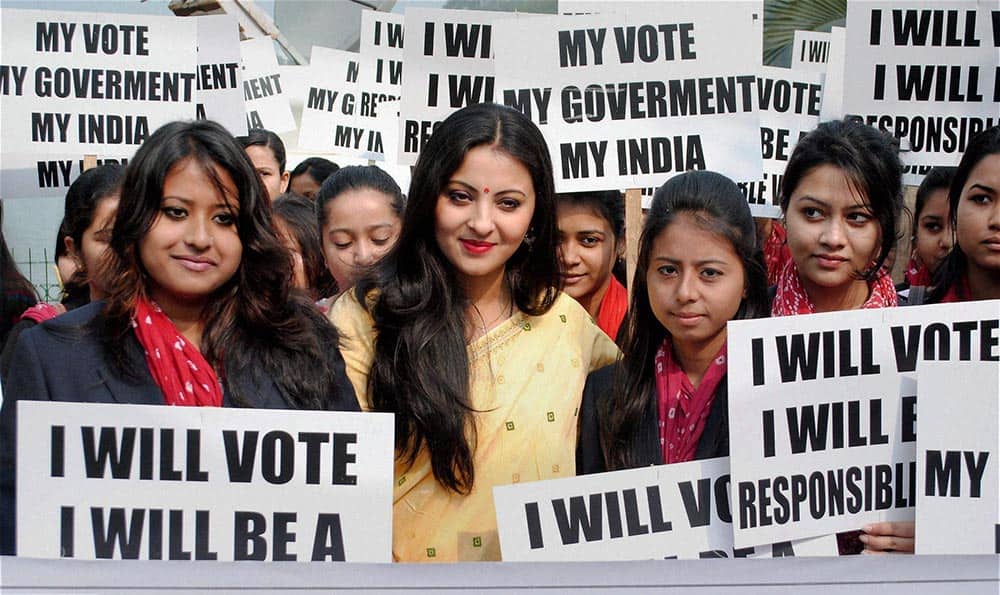 Assamese film actress Nishita Goswami joins students in an awareness rally on the occasion of National Voters Day organized by Volunteers For A Better India and District Administration in Guwahati.
