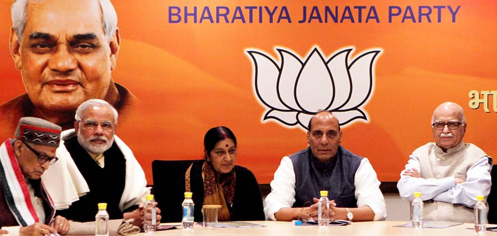 BJP President Rajnath Singh with Gujarat Chief Minister and BJP`s PM candidate Narendra Modi, senior leaders LK Advani, Sushma Swaraj and Murli Manohar Joshi during the party`s Central Election Committee meeting at party headquarters in New Delhi.