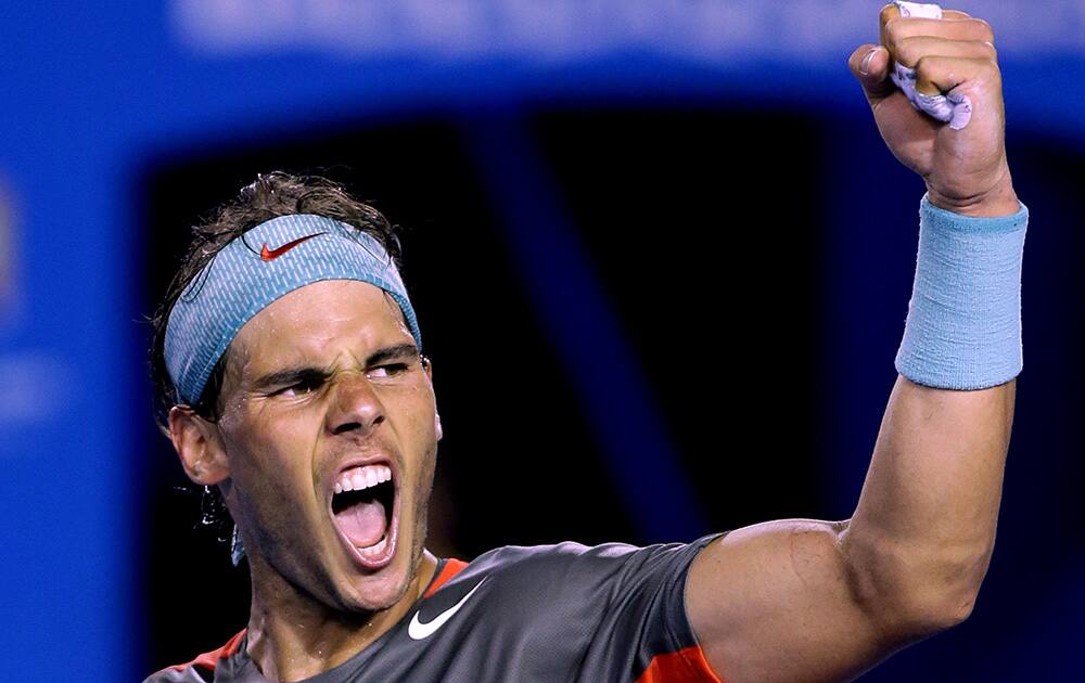 Rafael Nadal of Spain celebrates after defeating Roger Federer of Switzerland during their semifinal at the Australian Open tennis championship in Melbourne, Australia.