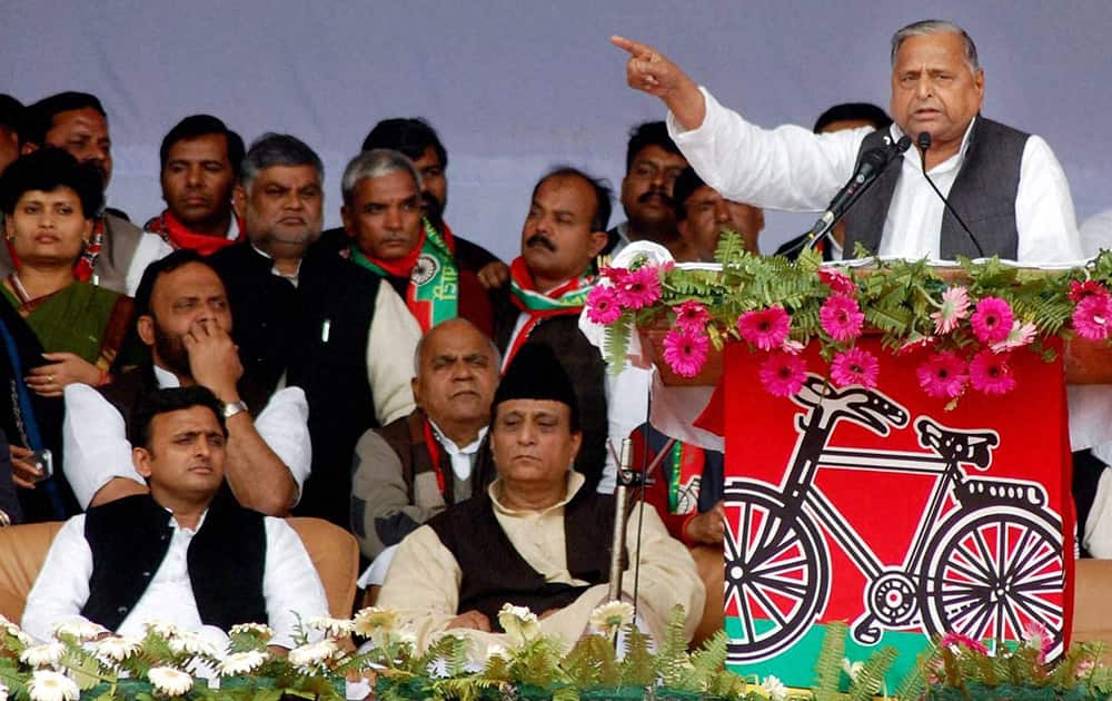 Samajwadi Party supremo Mulayam Singh Yadav addresses a public meeting in Varanasi on Thursday. UP CM Akhilesh Yadav and party leader Azam Khan are also seen.