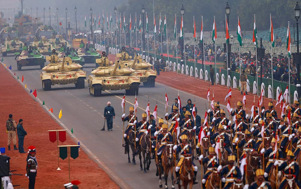 Tanks roll down Rajpath ceremonial boulevard during full dress rehearsals of the Republic Day parade in New Delhi.