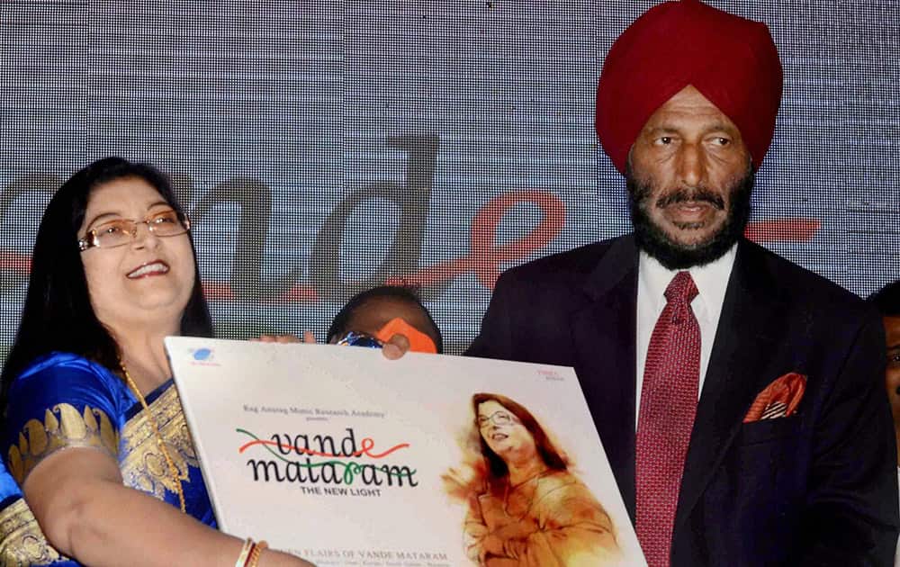 Former sprinter Milkha Singh with singer Smriti Lala during the launch of music video in Kolkata.