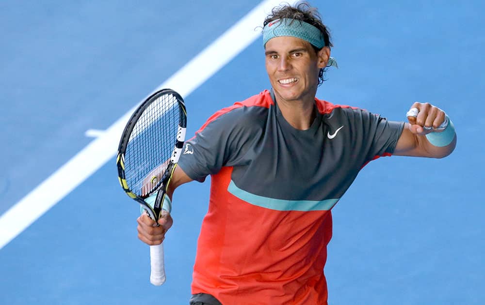 Rafael Nadal of Spain celebrates after defeating Grigor Dimitrov of Bulgaria during their quarterfinal at the Australian Open tennis championship in Melbourne, Australia.