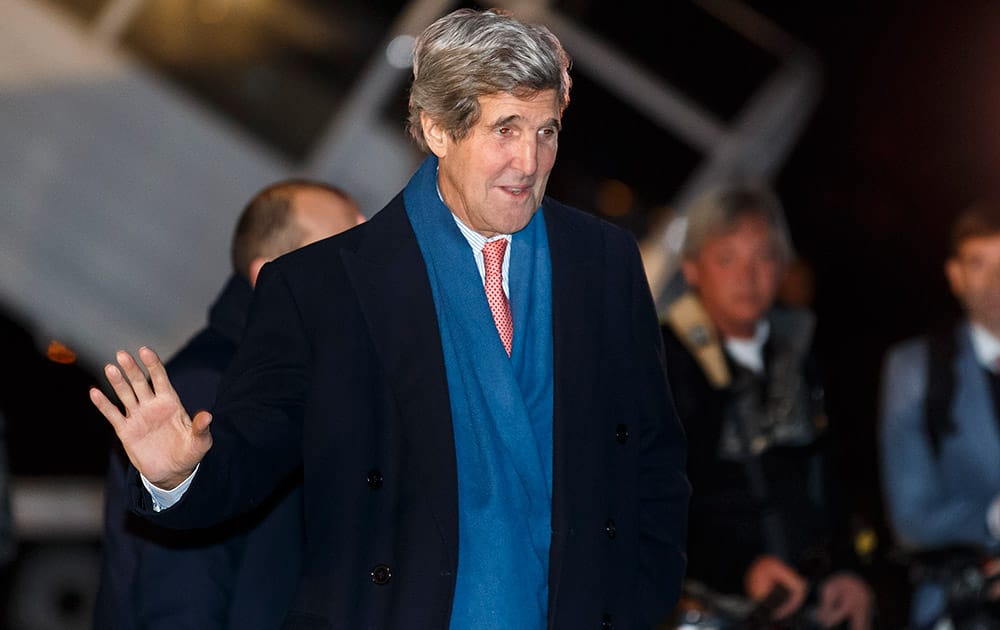 US Secretary of State John Kerry arrives at Geneva International airport, in Geneva, Switzerland.