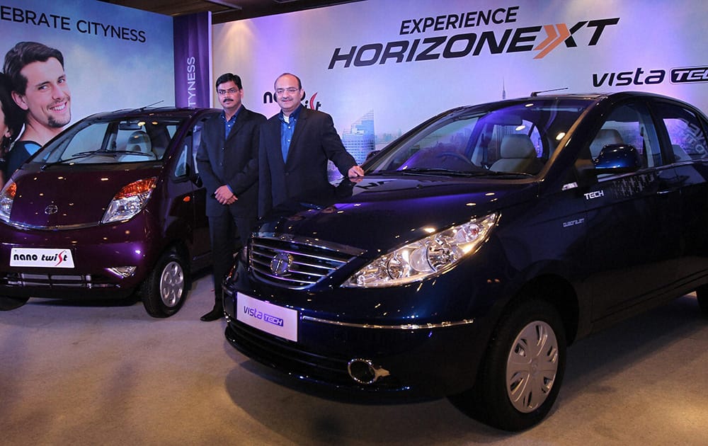 Tata Motors Sr Vice President (Passenger Vehicle Business Unit) Ankush Arora (R) with Girish Wagh, Sr Vice President, Passenger Vehicles Business Unit, Tata Motors during the launch of Nano Twist and Vista Tech in Bengaluru.