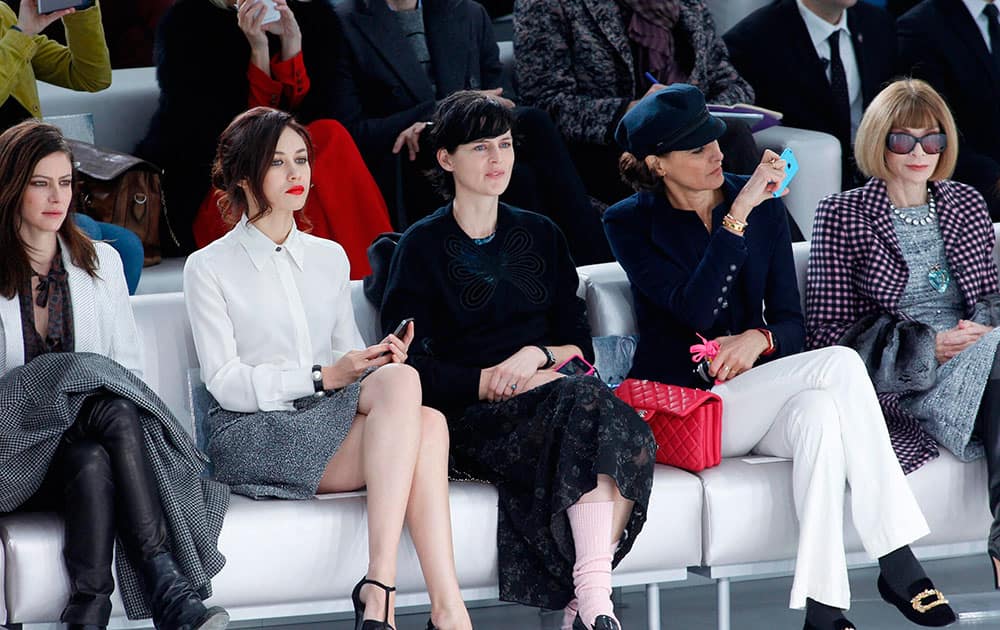 Actress Anna Mouglalis, model and actress Olga Kurylenko, Stella Tennant, Ines de la Fressange and Vogue editor Anna Wintour attend the Chanel Spring-Summer 2014 Haute Couture fashion collection.