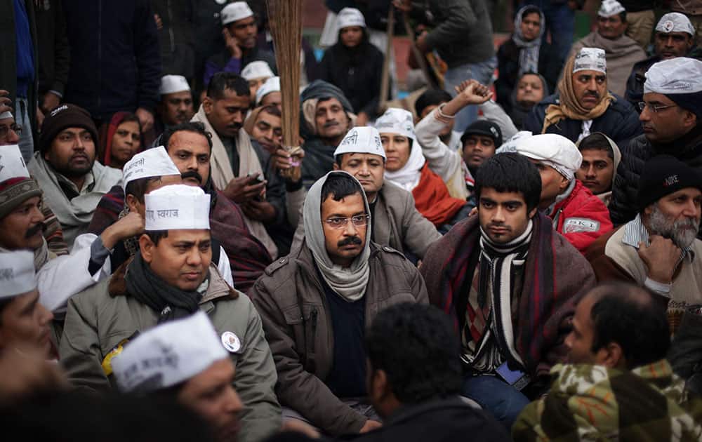 New Delhi Chief Minister Arvind Kejriwal, center, takes part in a protest rally against the police for the second consecutive day, in New Delhi.