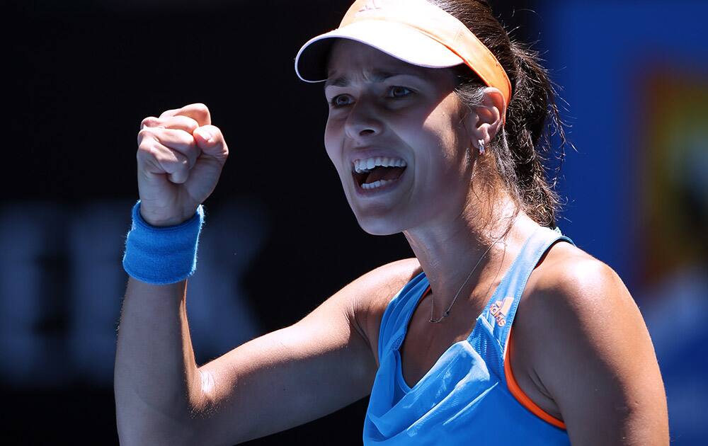 Ana Ivanovic of Serbia celebrates a point won against Eugenie Bouchard of Canada during their quarterfinal at the Australian Open tennis championship in Melbourne.