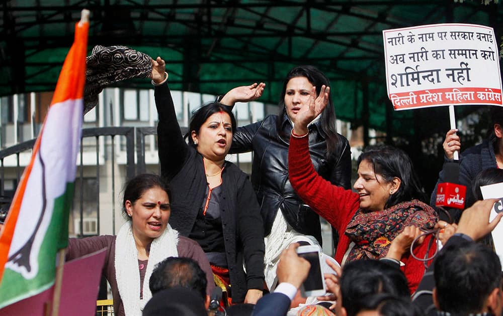 Delhi Pradesh Mahila Congress Committee members shout slogans during a protest march against Delhi Law Minister Somnath Bharti at PHQ in New Delhi.