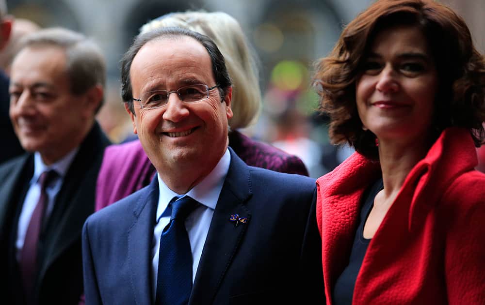 French President Francois Hollande poses for a photo with parliament president Anouchka van Miltenburg prior to a meeting in The Hague, Netherlands.