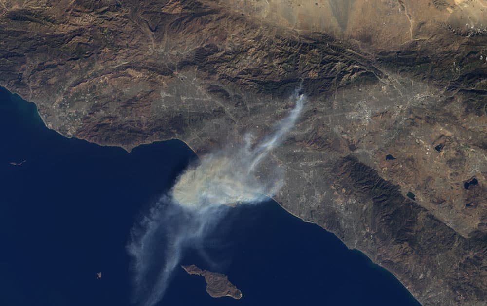 This image provided by NASA shows a satellite photo of smoke from the Colby Fire taken by the Multi-angle Imaging SpectroRadiometer (MISR) instrument aboard NASA`s Terra spacecraft as if passed over Southern California.