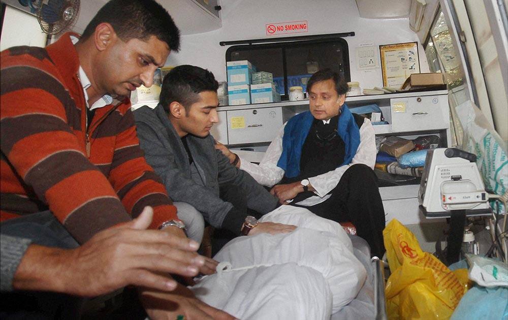 The body of Sunanda Pushkar is taken away from AIIMS by her husband Union minister Shashi Tharoor, her son Shiv Menon and other relatives, in New Delhi.