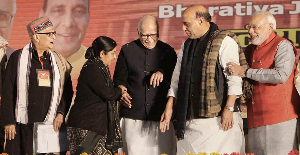 BJP PM candidate Narendra Modi, party President Rajnath Singh and senior leaders LK Advani, Sushma Swaraj and MM Joshi during BJP National Council Meet in New Delhi.