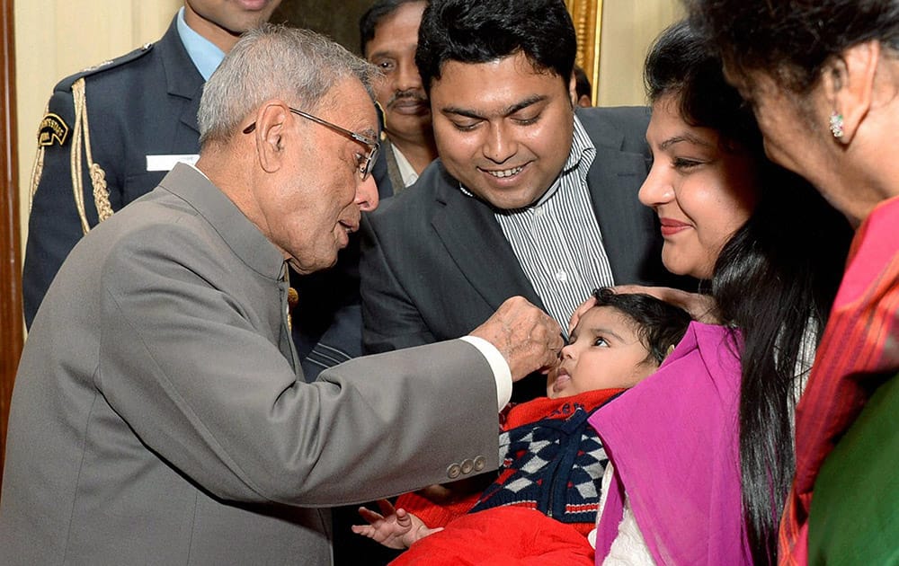 President Pranab Mukherjee launching the Nationwide Polio Round by administering polio drops to the children at Rashtrapati Bhavan in New Delhi.