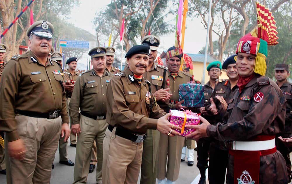 BSF DG D K Pathak is greeted by Border Guards Bangladesh officers during his visit to BOP Panisagar in Tripura.