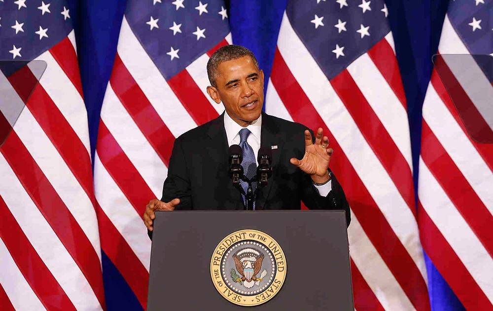President Barack Obama talks about National Security Agency (NSA)surveillance, at the Justice Department in Washington.