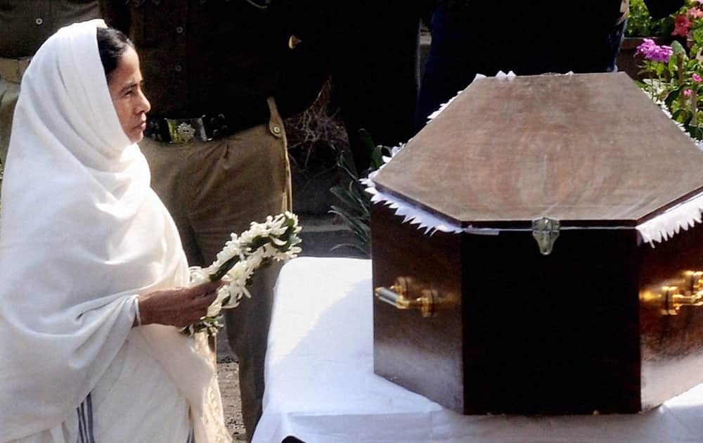 West Bengal Chief Minister Mamata Banerjee paying her respect to the mortal remains of legendary actress Suchitra Sen during her funeral ceremony in Kolkata on Friday. Suchitra Sen passed away at a hospital in Kolkata after suffering heart attack.