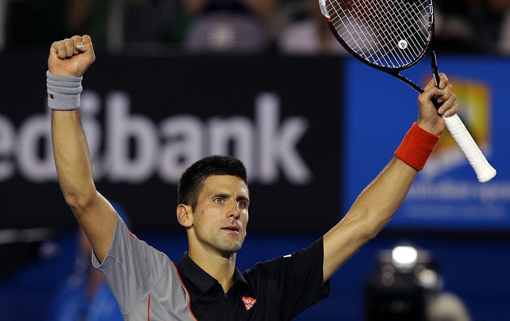 Novak Djokovic of Serbia celebrates after his win over Denis Istomin of Uzbekistan during their third round match at the Australian Open tennis championship in Melbourne, Australia.