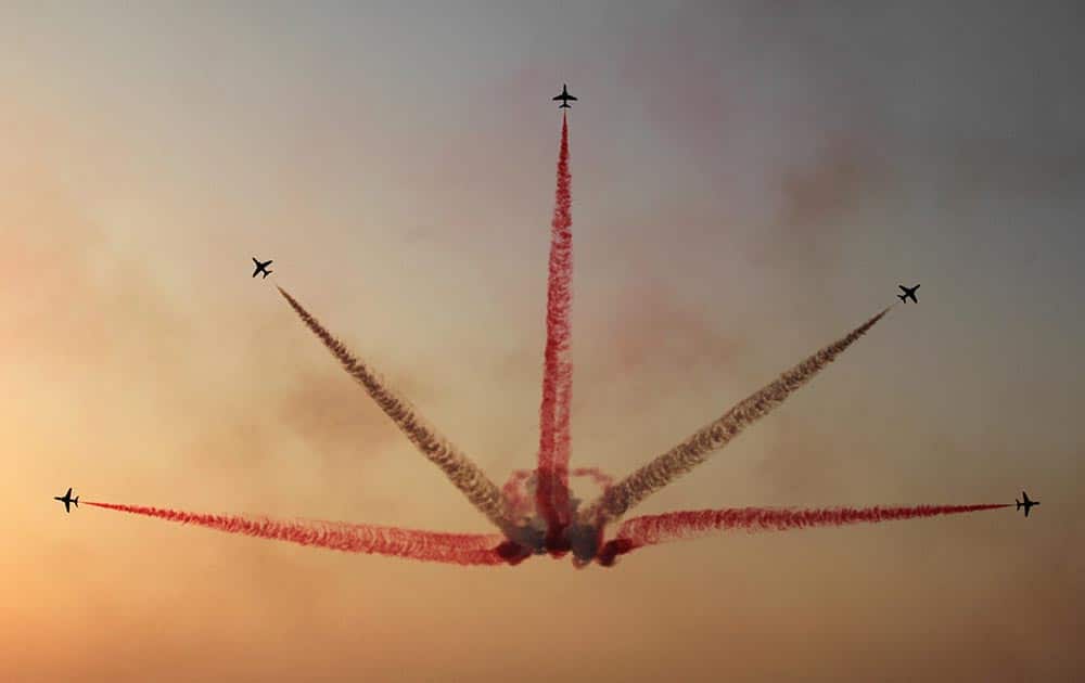 The Saudi Hawks Display Team performs Thursday, Jan. 16, 2014, at the Bahrain International Airshow in Sakhir, Bahrain. Bahrain`s state news agency said the International Airshow opened to announcements of more than $3 billion in agreements.