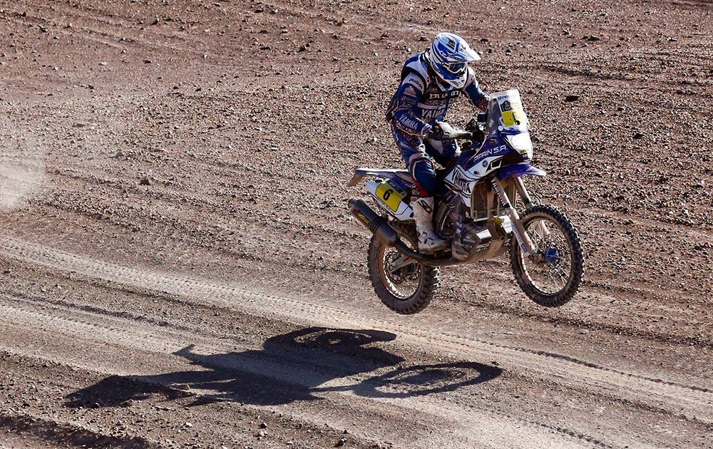 Yamaha rider Olivier Pain of France jumps with his motorcycle during the eleventh stage of the Dakar Rally between the cities of Antofagasta and El Salvador, Chile