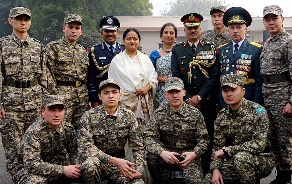 IAF chief Arup Raha and his wife with foreign cadets at NCC Republic Day Camp in New Delhi on Thursday. NCC DG Aniruddha Chakravarty is also seen.