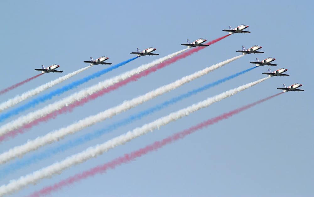 Taiwan`s AT-3 jet trainers fly in close formation over Tainan Air Force base in Taiwan. The air show marks the Air Force`s completion of the first batch of Taiwan`s upgraded indigenous defense fighter jets (IDF) and the installation of a new weapon system.