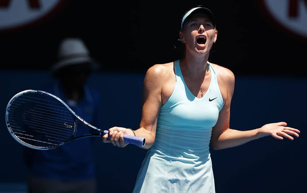 Maria Sharapova of Russia reacts during her second round match against Karin Knapp of Italy at the Australian Open tennis championship in Melbourne.