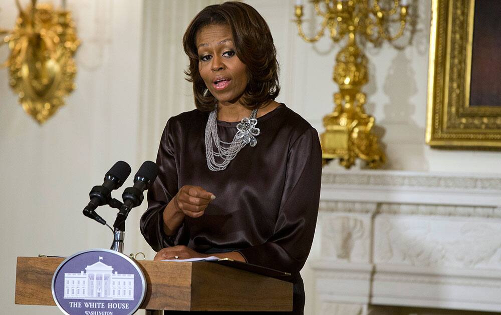 First lady Michelle Obama speaks in the State Dining Room of the White House in Washington. The White House hosted a screening of `The Inevitable Defeat of Mister and Pete,` a coming of age story about two inner-city youth who are left to fend for themselves in the Bronx.
