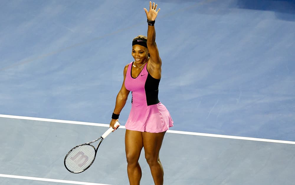 Serena Williams of the United States celebrates after winning over Ashleigh Barty of Australia during the first round match at the Australian Open tennis championship in Melbourne, Australia.