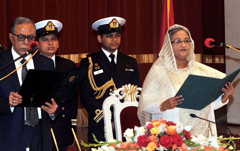 Bangladesh President Abdul Hamid, administers the oath to Bangladesh’i Prime Minister Sheikh Hasina during her swearing in ceremony in Dhaka, Bangladesh.