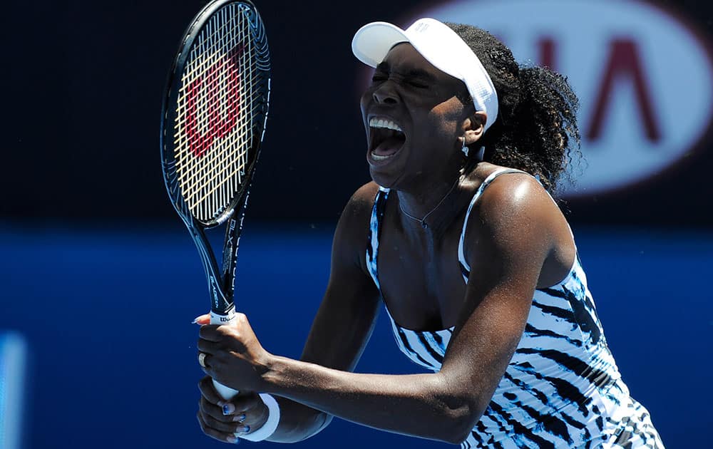 Venus Williams of the U.S. reacts during her first round match against Ekaterina Makarova of Russia at the Australian Open tennis championship in Melbourne.