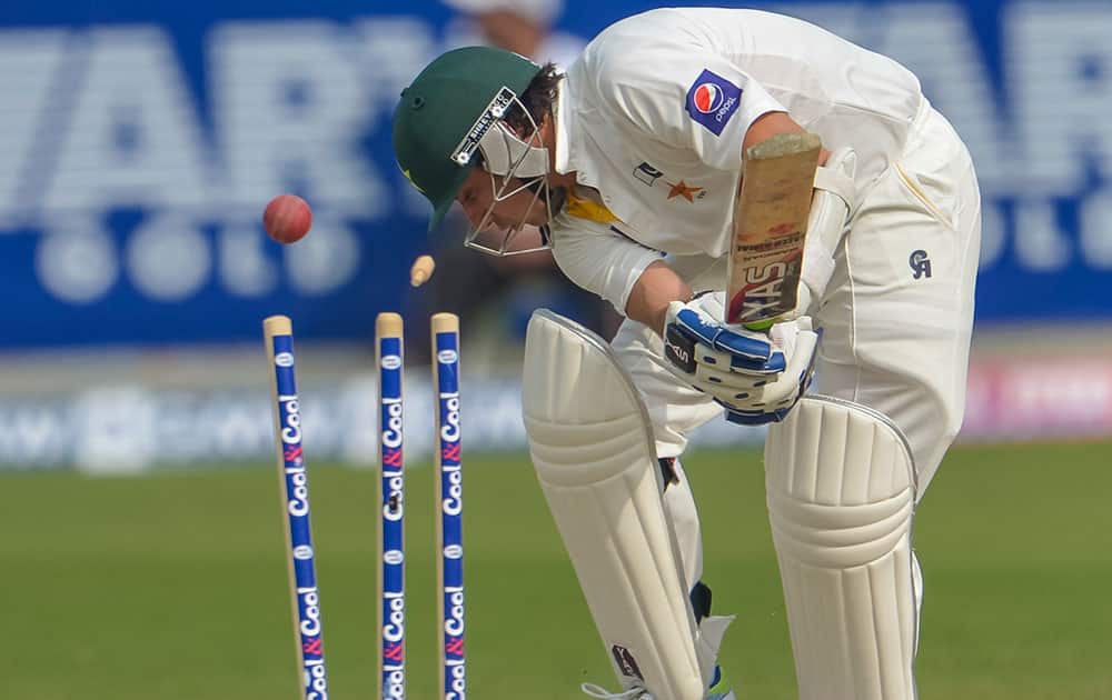 Pakistan`s Saeed Ajmal gets bowled during the second cricket test match between Pakistan and Sri Lanka at the Dubai International Cricket Stadium in Dubai, United Arab Emirates.