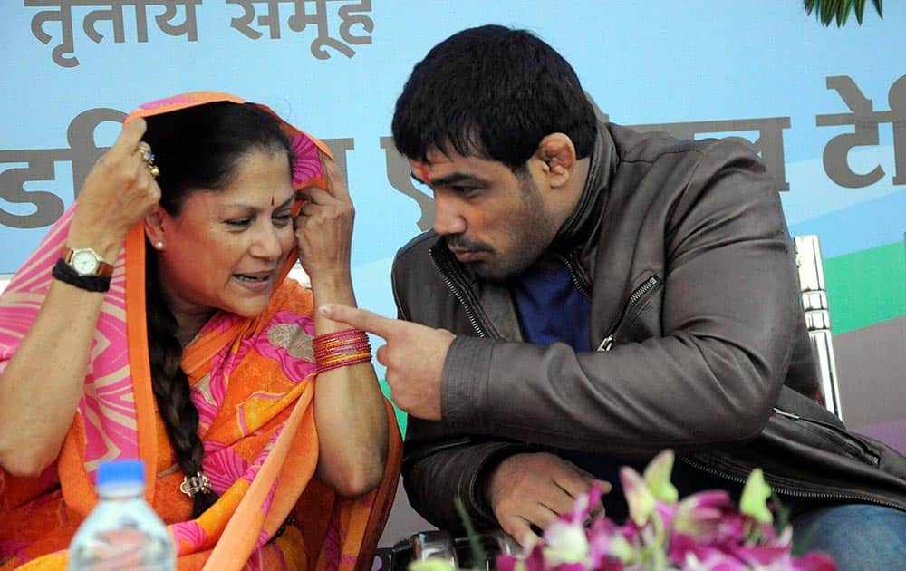 World Champion wrestler Sushil Kumar with Madhya Pradesh Sports Minister Yashodhara Raje Scindia during prize distribution ceremony of National PYKKA (Panchayat Yuva Krida and Khel Abhiyan) Women Sports meet in Bhopal.