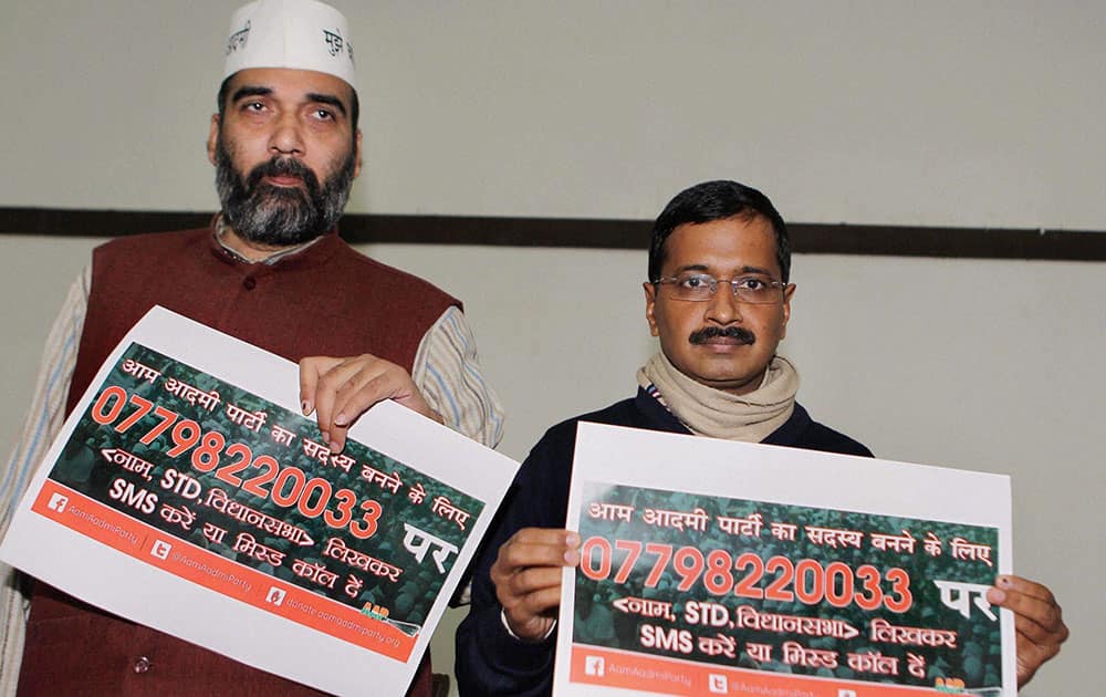 Delhi Chief Minister Arvind Kejriwal with AAP leader Gopal Rai at the launch of free membership campaign in New Delhi.