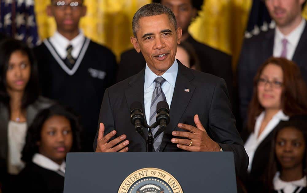 President Barack Obama speaks about his Promise Zones Initiative, in the East Room of the White House in Washington.