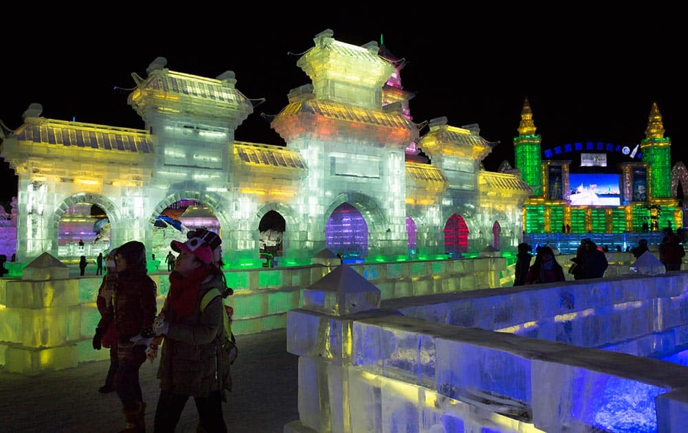 Tourists visit the the Harbin International Ice and Snow Sculpture Festival in Harbin, Heilongjiang province, China.