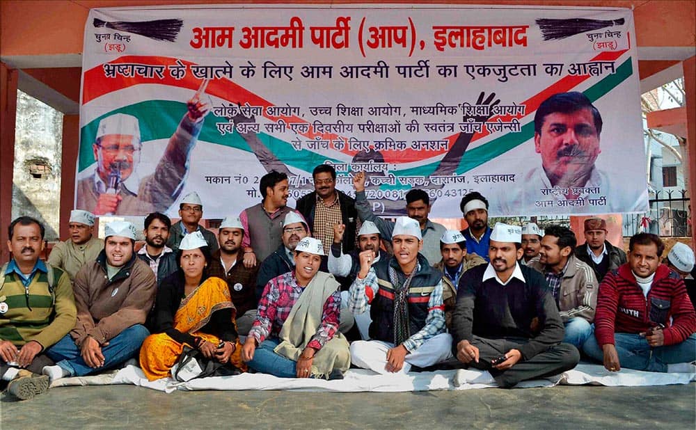 Aam Aadmi Party workers shouting slogans during a protest against corruption in various UP Government Office, at Allahabad.