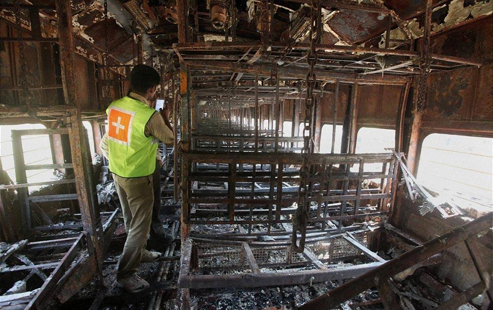 Burnt coaches of the Mumbai-Dehradun Express caught fire in the wee hours, near Dahanu in Thane district.