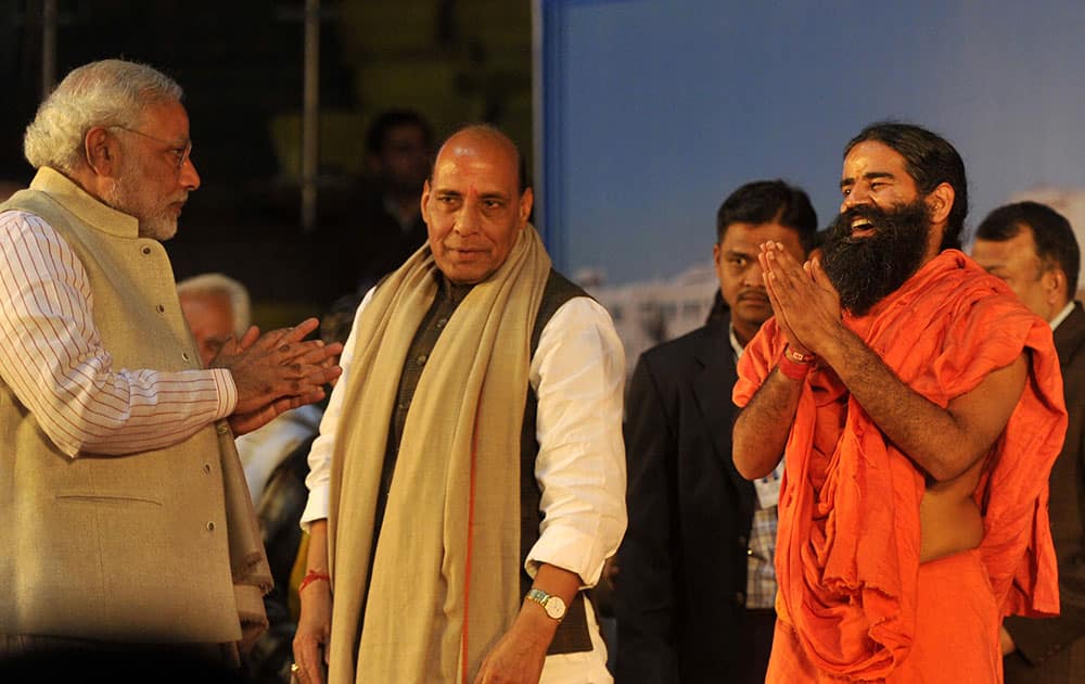 Narendra Modi was chief guest at the foundation day ceremony of yoga guru Baba Ramdev`s Bharat Swabhiman Trust, at Delhi`s Talkatora Stadium. (Pic Courtesy: DNA)